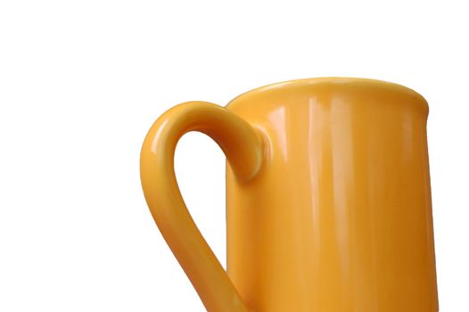 A Yellow porcelain mug isolated on white background