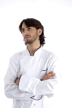 young chef with folded hands on an isolated white background