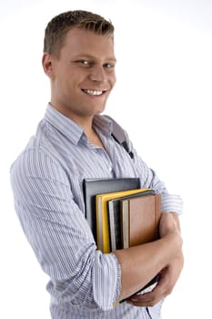 happy male holding books on an isolated background