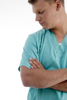 young male doctor against white background