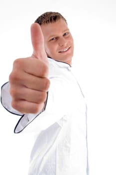 blonde chef wishing goodluck on an isolated white background