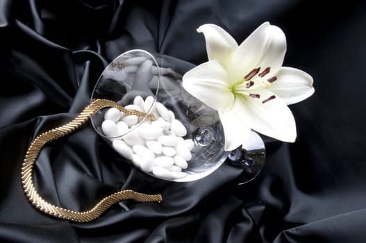 Jewelry and other precious stones on black background fabric