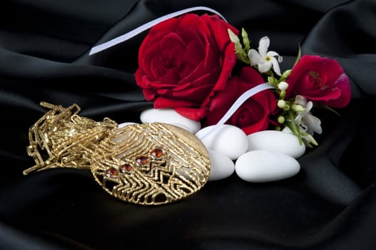 Jewelry and other precious stones on black background fabric