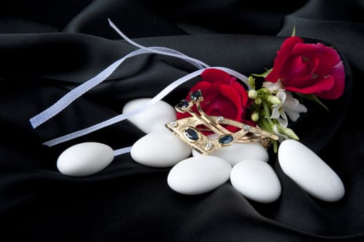 Jewelry and other precious stones on black background fabric