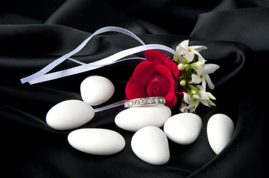 Jewelry and other precious stones on black background fabric