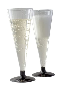 Two glasses of spumante, one with boiling foam