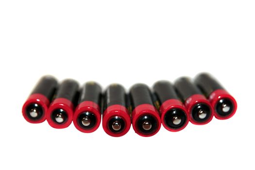 batteries grouped together in a row against a white background