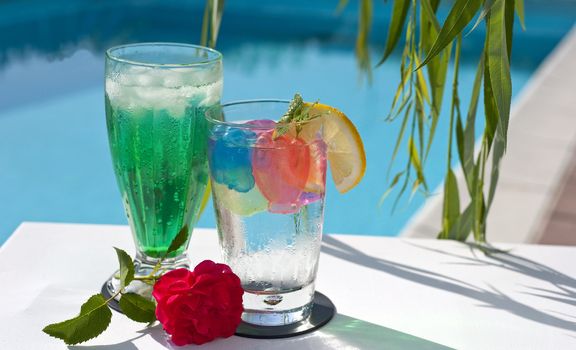Iced drinks placed on board a private pool.