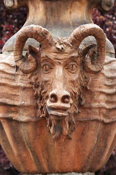 Detail of the ancient decorative amphora - head of the goat