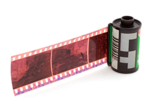 35 mm negative film and roll isolated in white background
