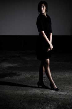 Photo Of A Beautiful Young Woman In A Black Dress