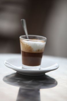 Photo Of A Glass Of Cappuccino With Foamy Cream