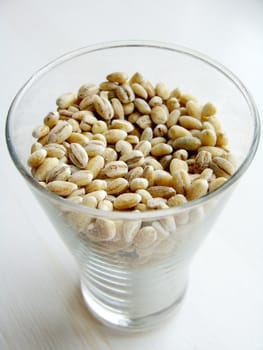 Pearl barley in a glass close up