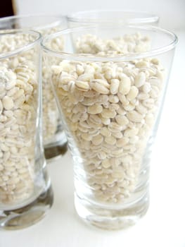 Pearl barley in a glass close up 