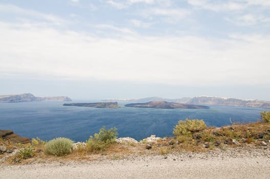 Beautiful view on Santorini volcano, blue see and sky