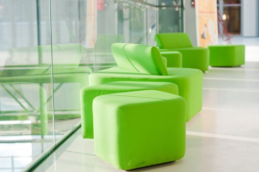 Shot of green armchairs in interior, daylight