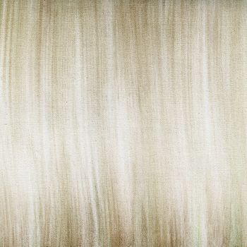 brown and green cryon pastel smudges on white artist canvas, self made by photographer