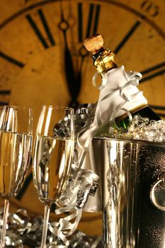 Champagne in bucket with glasses ready for New Years festivities