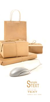 Parcel packages with computer mouse on white background