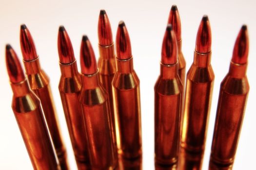 ammunition all in a cluster on a white background