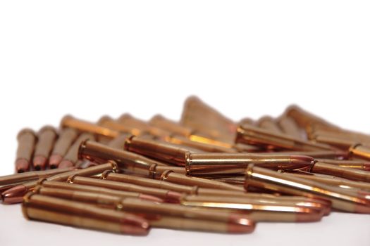 ammunition all in a cluster on a white background