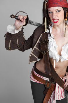 Sexy female pirate holding sword