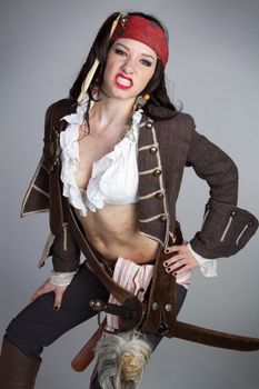 Sexy pirate woman clenching teeth