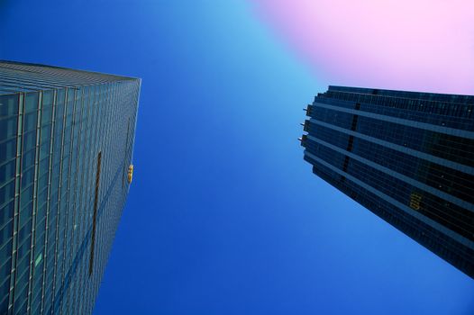 modern office skyscraper building ove blue sky