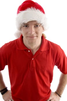 male wearing christmas hat looking at camera against white background