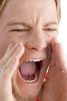 face of male shouting loudly in front of camera