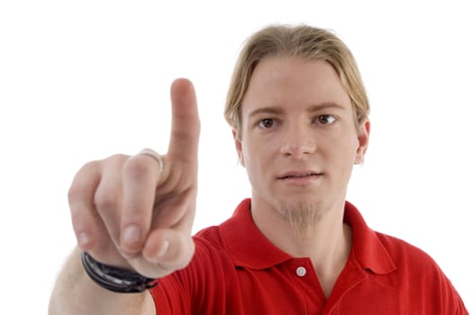 man pointing with finger against white background