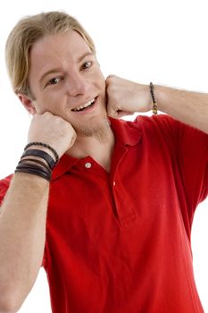 young american male posing with his hands on chin on an isolated white background