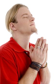 smart young male praying to god on an isolated background