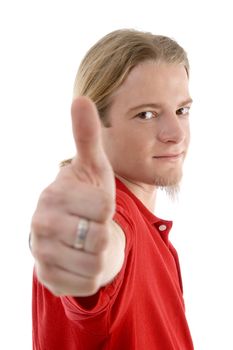 handsome caucasian male showing thumbs up hand gesture on an isolated background