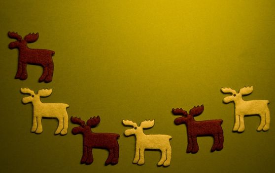 five reindeers on green paper (xmas motif)