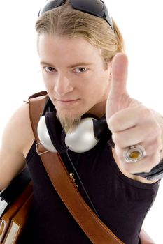 american student showing thumbs up hand gesture against white background
