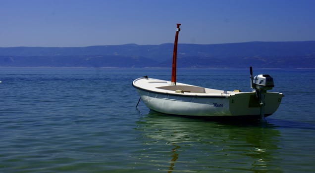 Smal boat in Adriatic Sea in Croatia