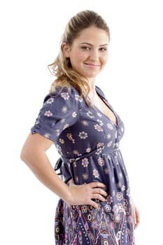 side view of smiling young female against white background