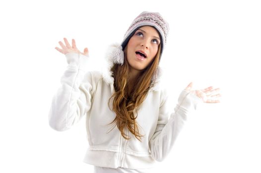 teenager female posing in winter wears on an isolated white background