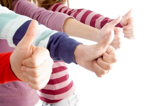 hands showing thumbs up gesture on an isolated white background