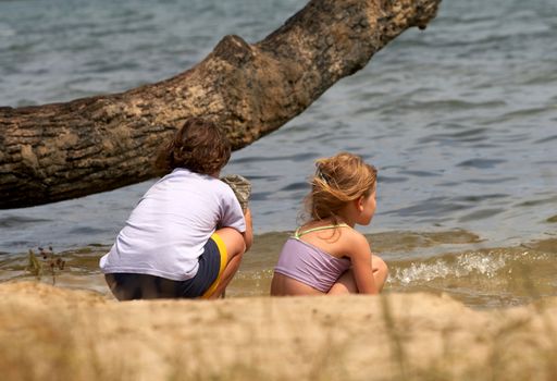 children on lake