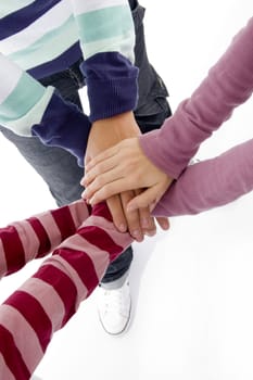 joined hands of friends on an isolated background