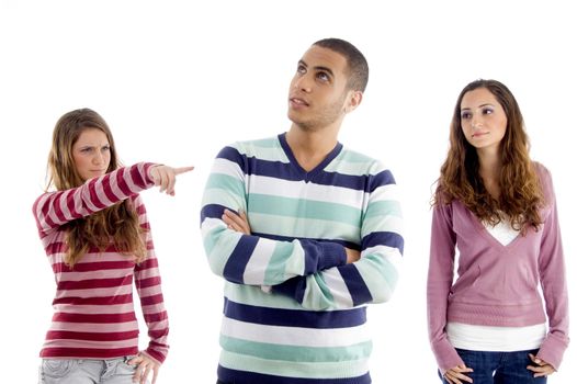 teens girl pointing towers boy and guy looking sideways against white background