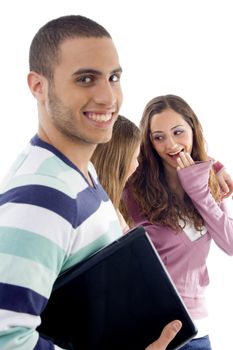 portrait of young students posing together on an isolated white background