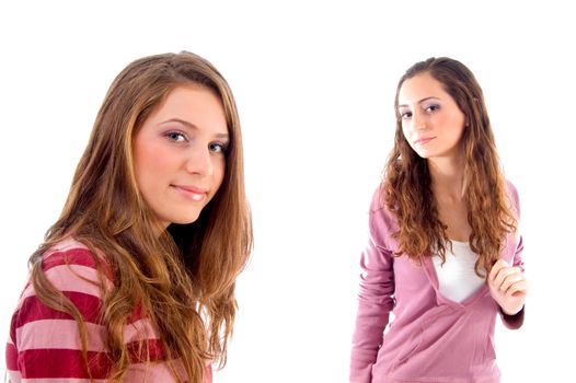 beautiful girls standing in front of camera against white background