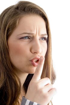 female showing keep shushing sign in anger on an isolated white background