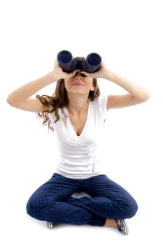 sitting female looking through binocular with white background