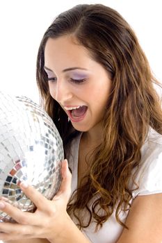 happy female holding disco ball on an isolated background