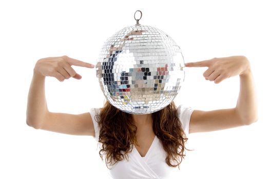 woman balancing mirror ball with fingers with white background