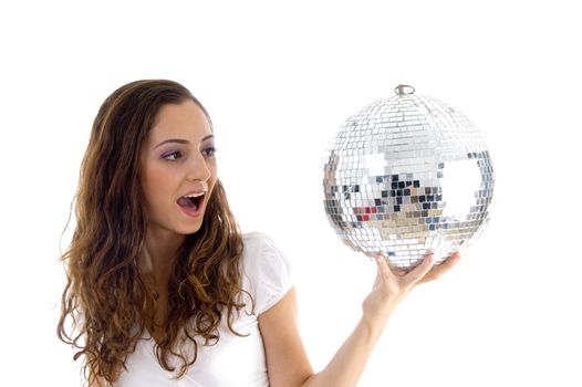 female holding mirror ball with one hand on an isolated background